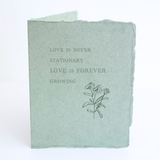 "Love is never stationary" Flower Love Folded Greeting Card